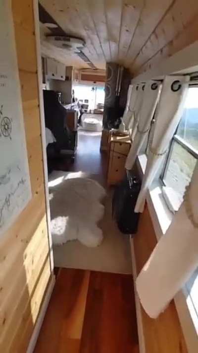 Old school bus turned into moving apartment