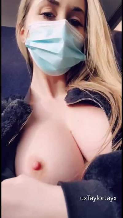 Sitting with my boobs out under my jacket .. It was turning me on thinking he&rsquo;d catch me