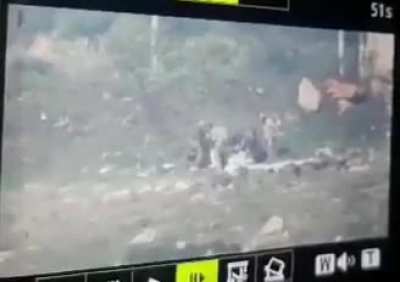 Members of the Syrian Republican Guard target a group of militants with a "Konkurs" missile in Bsartoun, western countryside of Aleppo
