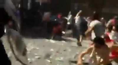 Spanish protesters bombard cops with a hail storm of rocks