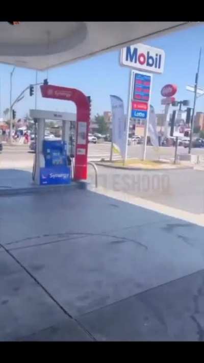 Little Kid Spotted Smoking and Driving at Gas Station