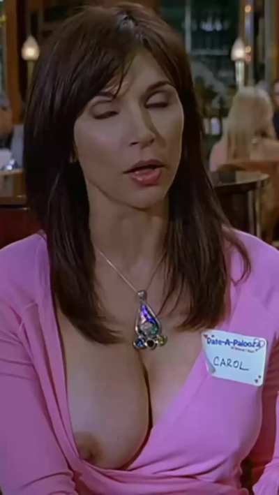 Kimberly Page's big titty pops out and her top gets caught on her hard nipple in 