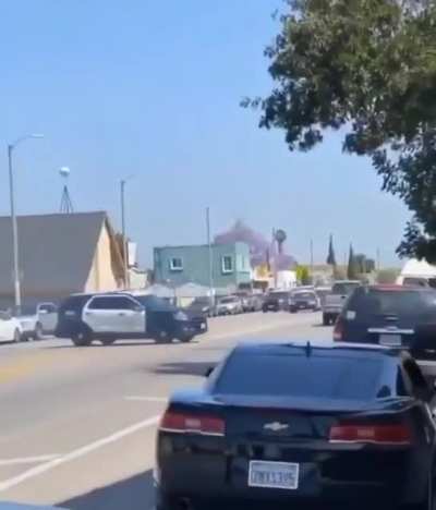Driver evades police spike strip