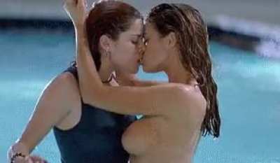 Denise Richards and Neve Campbell kiss