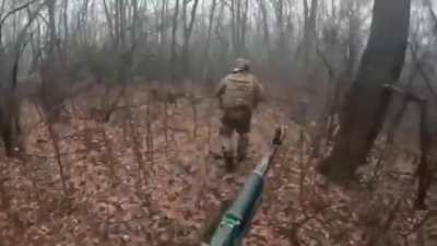 GoPro footage showing Russian troops attacking and capturing an Ukrainian trench, bodies can be seen.
