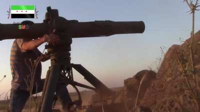 FSA's Houran Brigade BGM-71 TOW team strike on a Syrian Army tank outside of Busra al-Harir - 7/2/2014