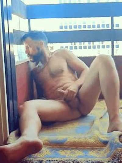 Spying on my neighbor jerking off near the window.