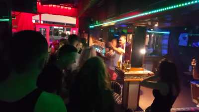 Girl rings guy bell with slap during slapping contest 