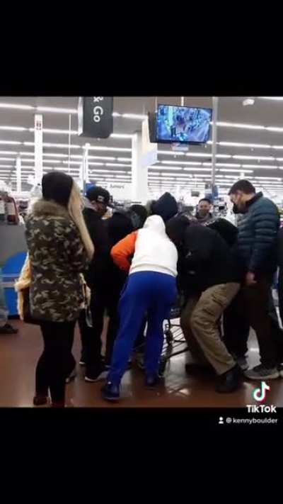 13 grown adults fighting over a Children&rsquo;s trading card game at Walmart