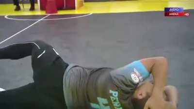 This blocking using head in a game of Sepak Takraw (The ball is made from rattan)