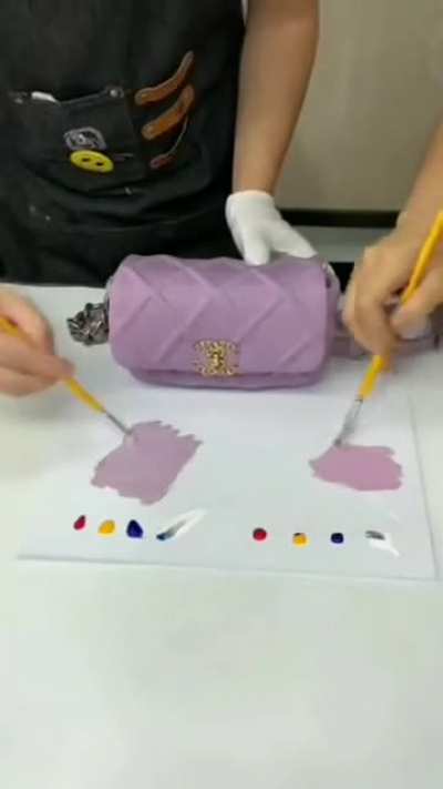 Guy mixes colors freehand to get desired mix using the dark arts