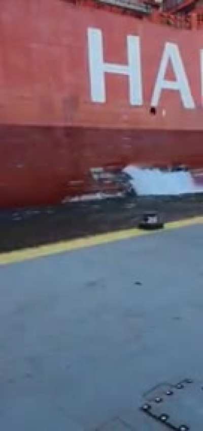 Filming an uncontrolled cargo ship.