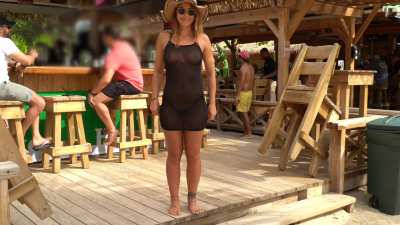 See-through mesh outfit at the beach bar [GIF]