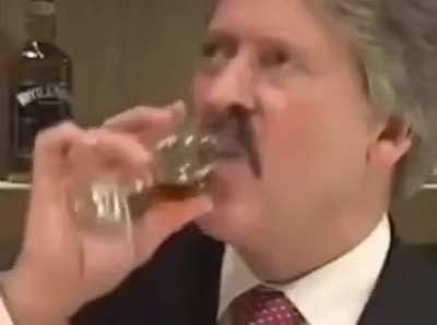 Sips Whiskey