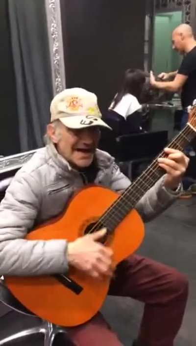 Old man plays the theme for "The Good The Bad and the Ugly"