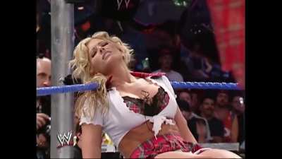 Torrie Wilson gets a faceful of Mae Young. Twice!