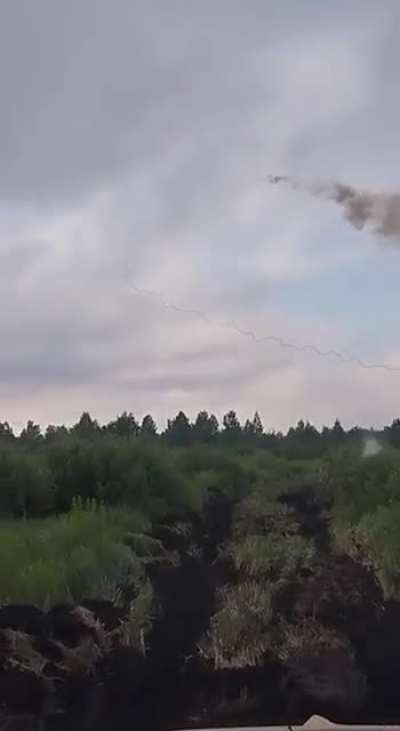 Archival footage of Ukrainian soldiers firing a UR-77 "Meteorit" line charge and detonating it