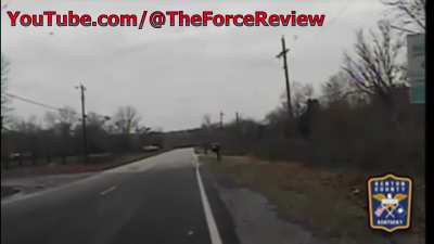 Deer rams police car.