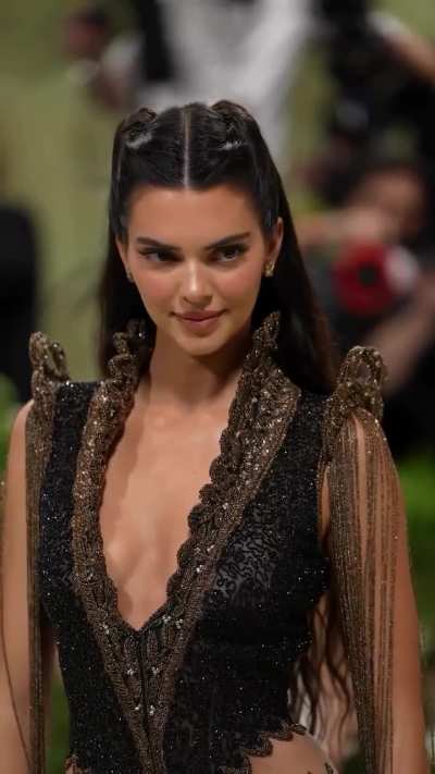 At the Metgala wearing a Givenchy Haute Couture Fall Winter 1999 dress in tulle embroidered with black and brass beads and sequins designed by Alexander McQueen - May 2024