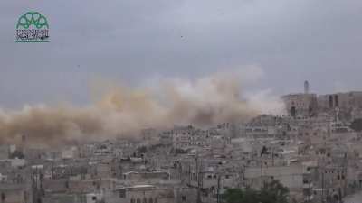 Islamic Front engineers detonate a reported 20 tons of explosives underneath the Carlton Citadel Hotel, used as an SAA barracks - 5/8/2014