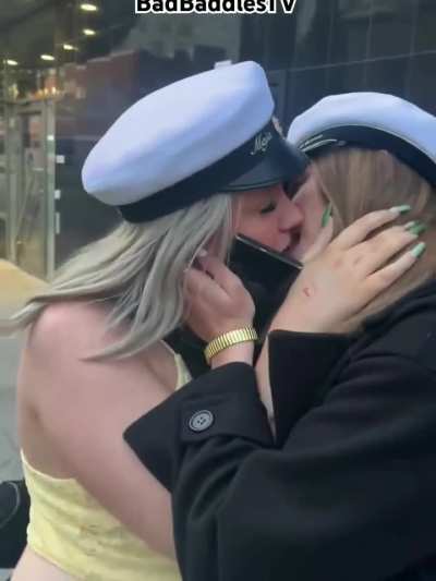 Blonde girls kiss