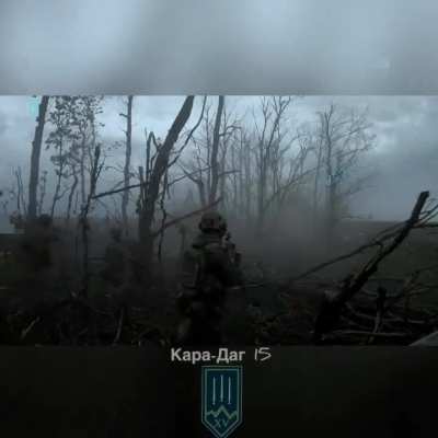 Ukranian national guardsmen from the "Kara-Dag" brigade in cooperation with M113 APCs, storm and clear enemy positions in Zaporozhye.