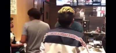 Kid doesn't wanna wait in line, tries a little racism.
