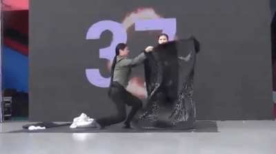Lady Setting The Record For The Most Costume Change Illusions In Under A Minute