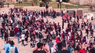 Happening right now at Damascus Gate in Jerusalem, peaceful protestors waving Palestinian flags and chanting for freedom were fired at with stun grenades and doused in noxious liquid.