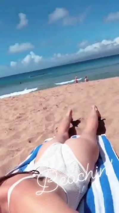Michelle Ellyse Schlaman reading at the beach