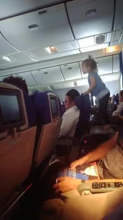 Letting children run wild during an 8 hour flight