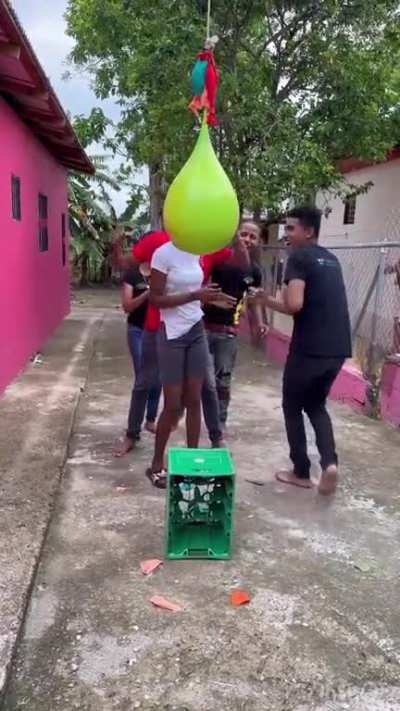 A tense game of water balloon.