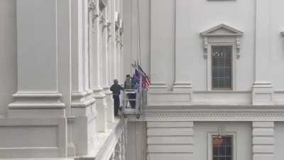 Several people got on to a scaffolding outside Senate, took it to second floor, which looked like the area where McConnell&rsquo;s office is located, and started banging on windows