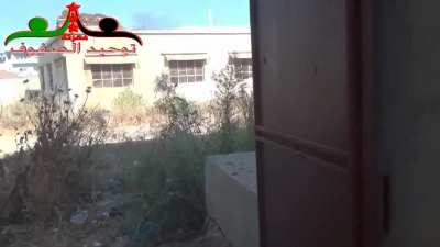 Sharp dressed FSA fighter enthusiastically engages with SAA forces during clashes in Tafas - 9/29/2013