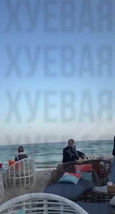 Ukrainian civilians on the beach in Odesa watched their air defense shooting down Iranian/Russian "Shahed" UAVs attacking the city. Published 22.11.2025