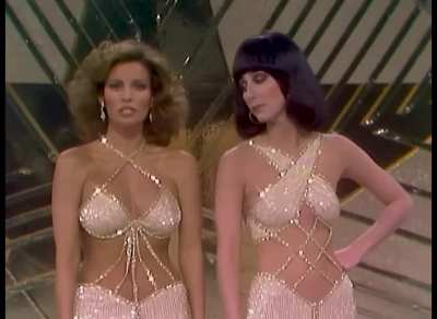 Cher singing "I'm a Woman" with Raquel Welch, in 1975