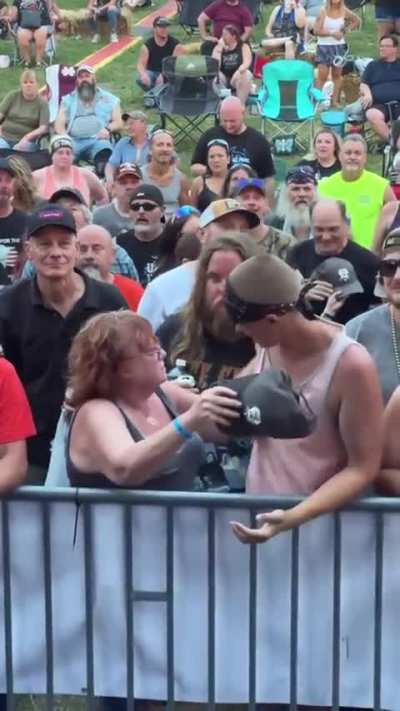 Young man making a lady&rsquo;s day with a simple gesture  