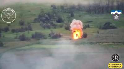 A Ukrainian FPV pilot attacks a Russian IFV moving towards the frontline. Some infantry soldiers on the vehicle try to jump off before the impact.