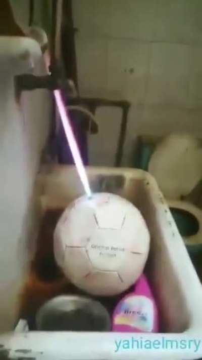 Kids Pumping a Ball
