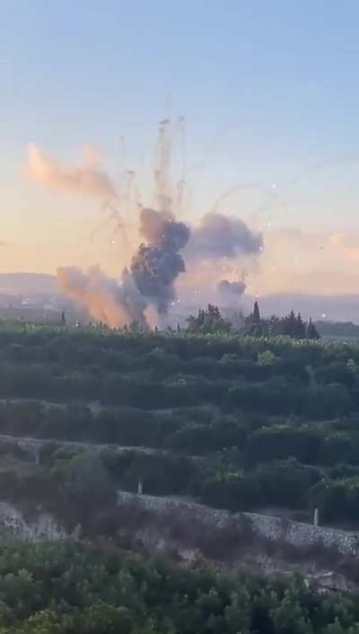 Hezbollah rockets/ munitions exploding from multiple Israeli air strikes in southern Lebanon 