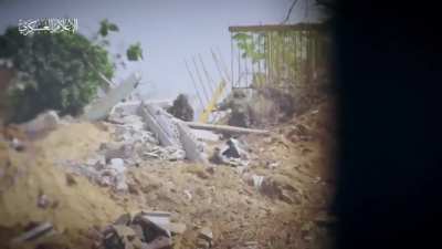 Hamas sniper in northern Gaza appears to shoot 2 IDF soldiers with one bullet and then hits a 3rd soldier who attempts to take cover.