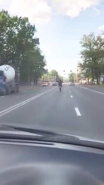 This dude was just asking for it doing this in traffic