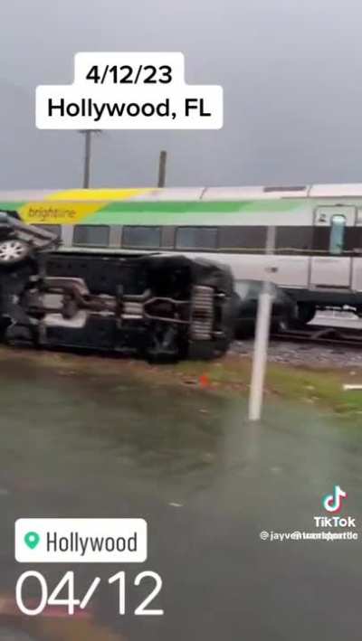 Train hits car hauler