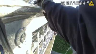 NYPD officer talks suicidal man off ledge before breaking down
