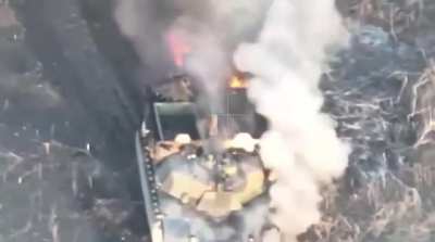 American donated M1 Abrams  burning after being hit by 3 russian FPV's.