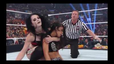 Paige takes AJ's title and her dignity