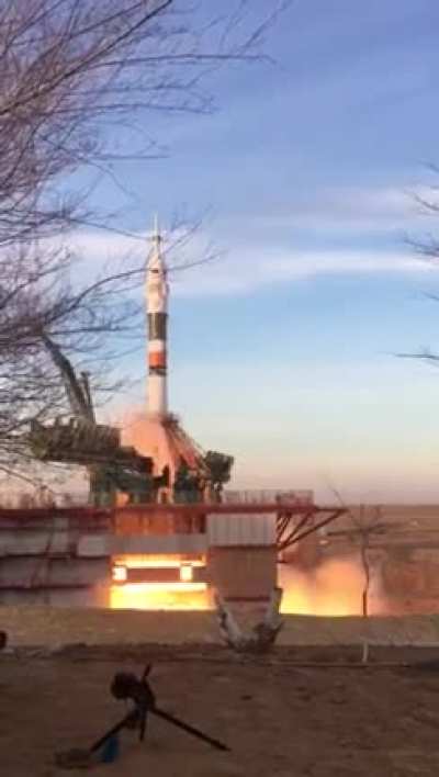 A Soyuz launch is captured by a man at an absurdly close range.