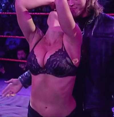 Lita trying to kiss Edge