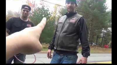 Karen starts trouble with Hells Angels in front of their compound