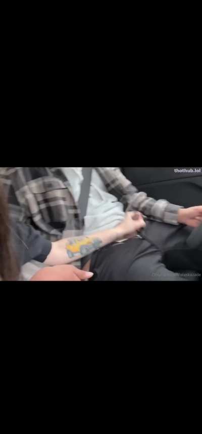 Lesbian giving her friend a handjob in a car